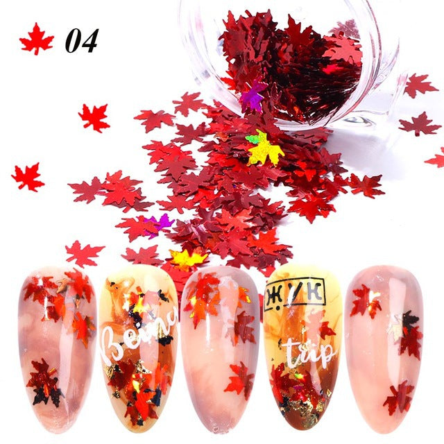 Gradient maple leaf nail sequins in assorted autumn colors for nail art-enhanced manicures