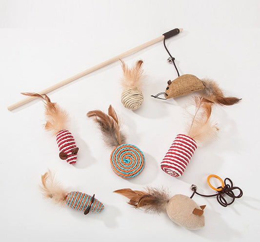 Colorful Woof & Meow pet toys for dogs and cats, featuring plush and rubber textures for interactive play.