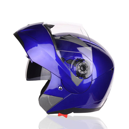 Black motorcycle helmet with aerodynamic shell and clear visor