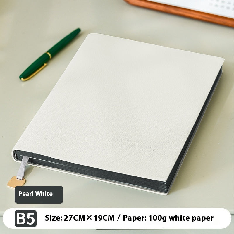 Litchi pattern soft leather covered notebook with textured finish and lined pages