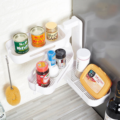 Rotating wall-mounted plastic storage box for kitchen, bathroom, or toilet debris, punch-free design