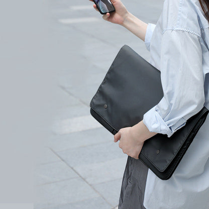 Black and white laptop bag protective cover viewed from the front