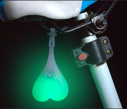 Beating Heart bike rear lights displaying a red heart-shaped LED pattern on a bicycle seat post