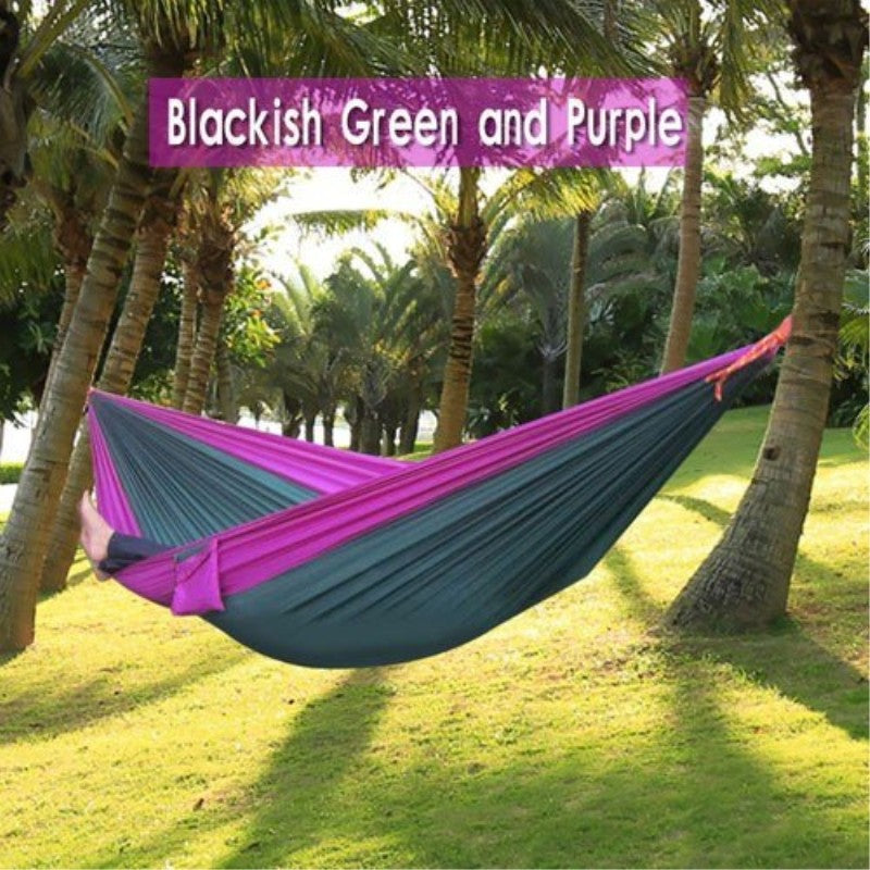 Portable nylon parachute double backpacking hammock suspended outdoors, shown in blue and green; My Store brand