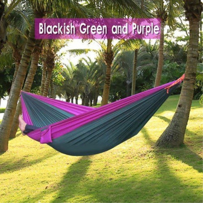 Portable nylon parachute double backpacking hammock suspended outdoors, shown in blue and green; My Store brand