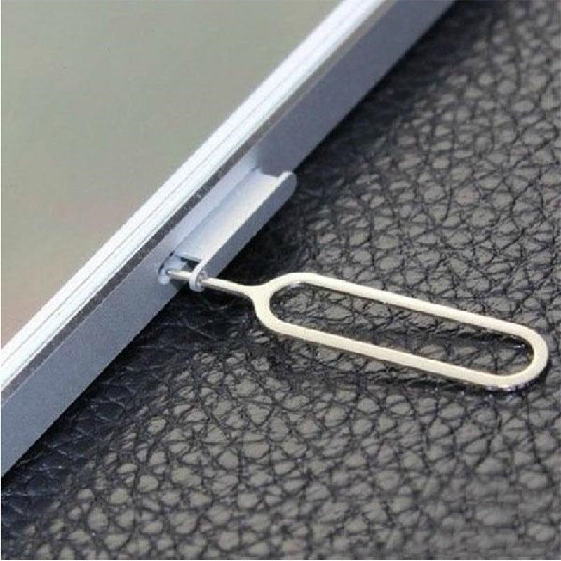 SIM card slot card taking pin compatible accessory close-up