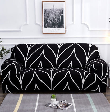 Elastic universal sofa cover in neutral fabric, fitted over a sofa for full furniture protection