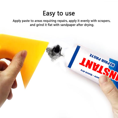 White tube of home wall repair cream for filling cracks and smoothing damaged surfaces