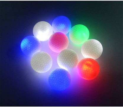 Flashing LED golf ball for nighttime play, shown in bright light-up colors