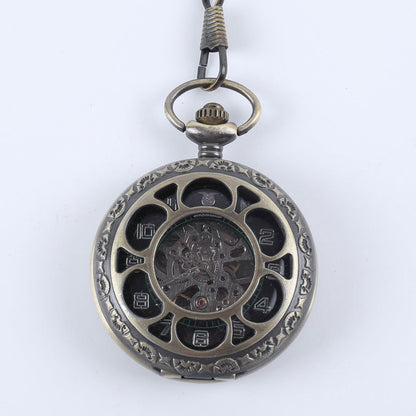 Vintage pocket watch with classic metal case and visible clock face