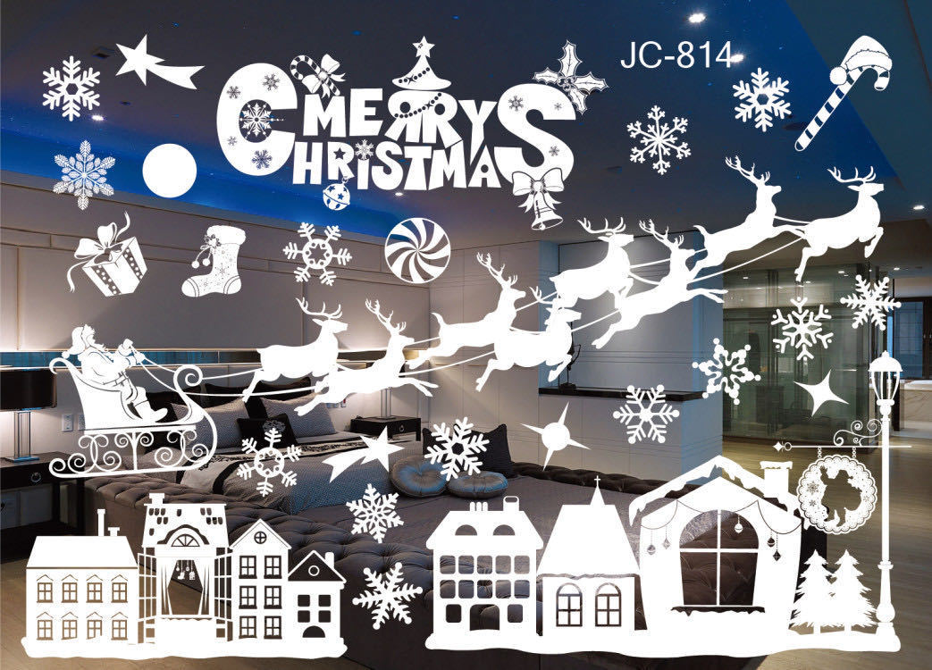 Christmas decorations store window stickers displayed on a glass window