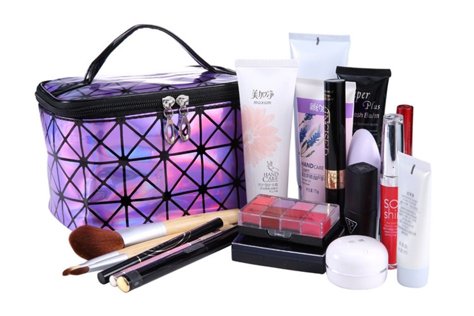 3D laser cosmetic bag with holographic finish and zippered top viewed from above