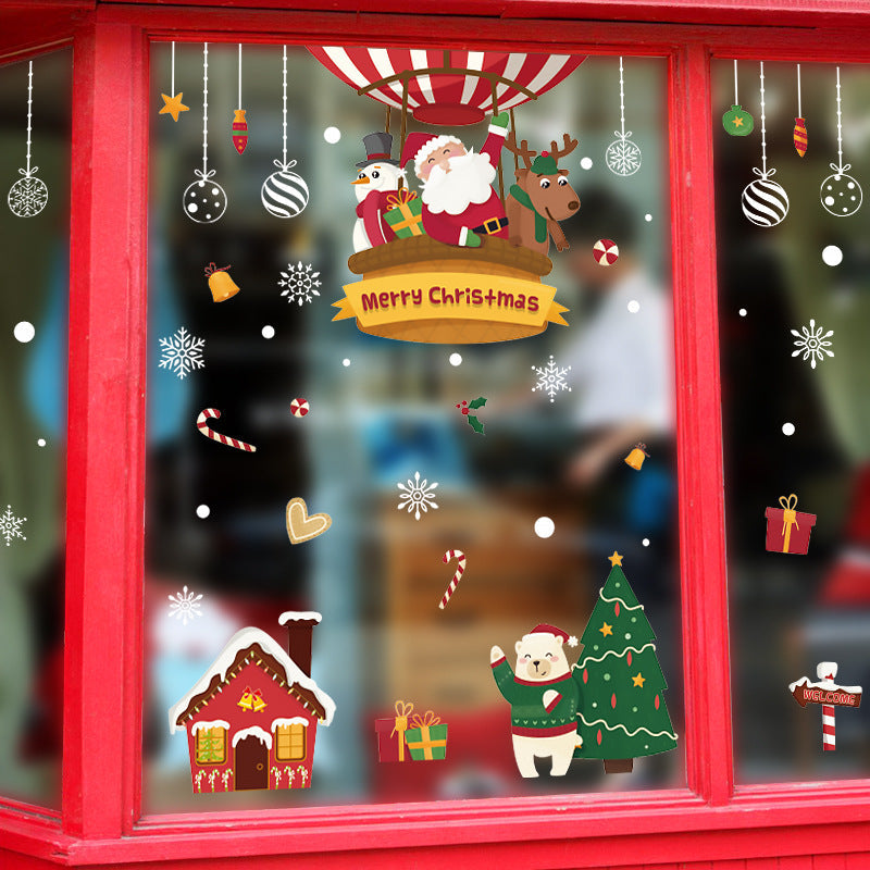 Christmas decorations store window stickers displayed in a festive holiday storefront design