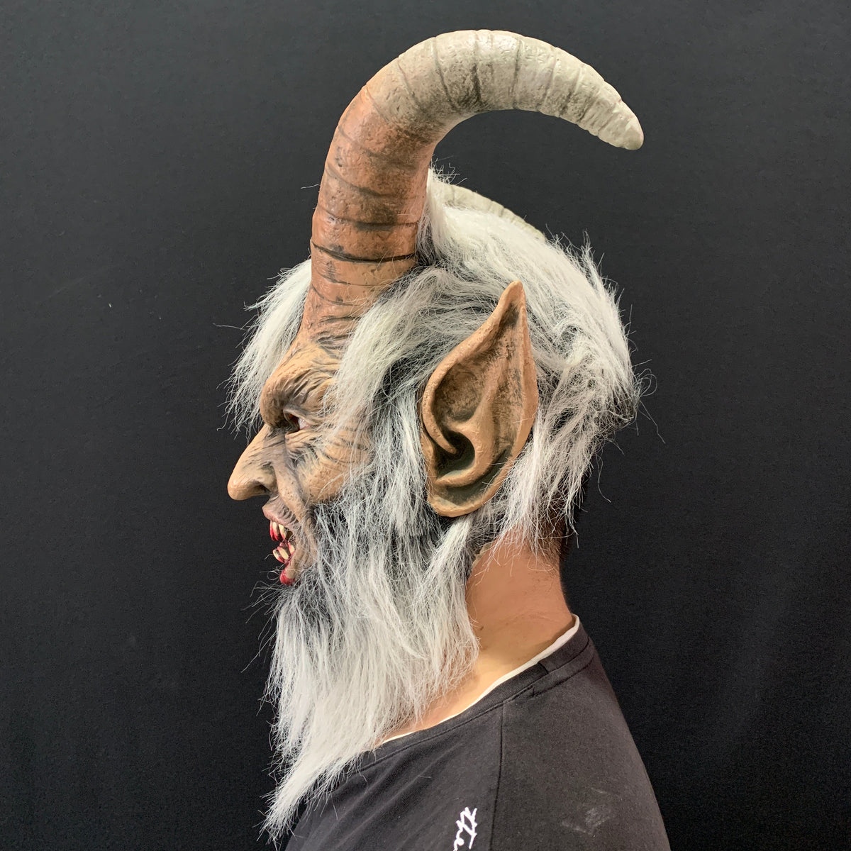 Lucifer mask with a realistic human face design, displayed against a plain background