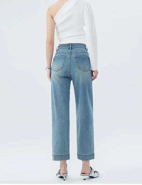 Spring fashion denim jeans from BACKUPMYFILESNOW® displayed on a model, showcasing a stylish fit and classic blue wash.
