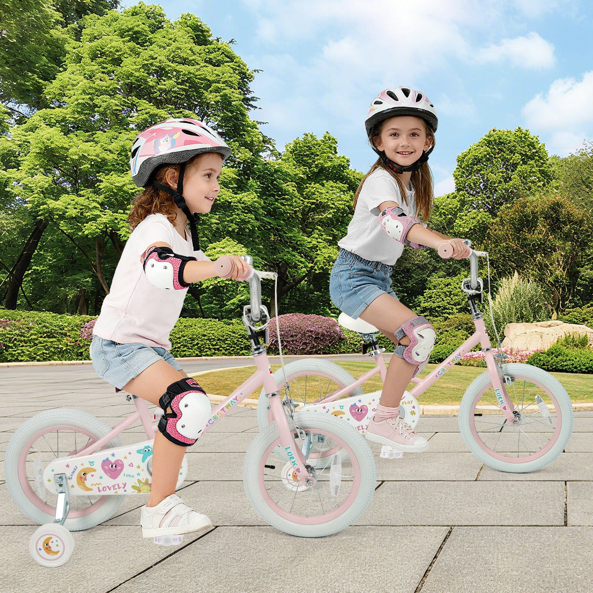 Pink kids bike with stars and moon design, 12-18 inch size, featuring training wheels, ideal for young children.