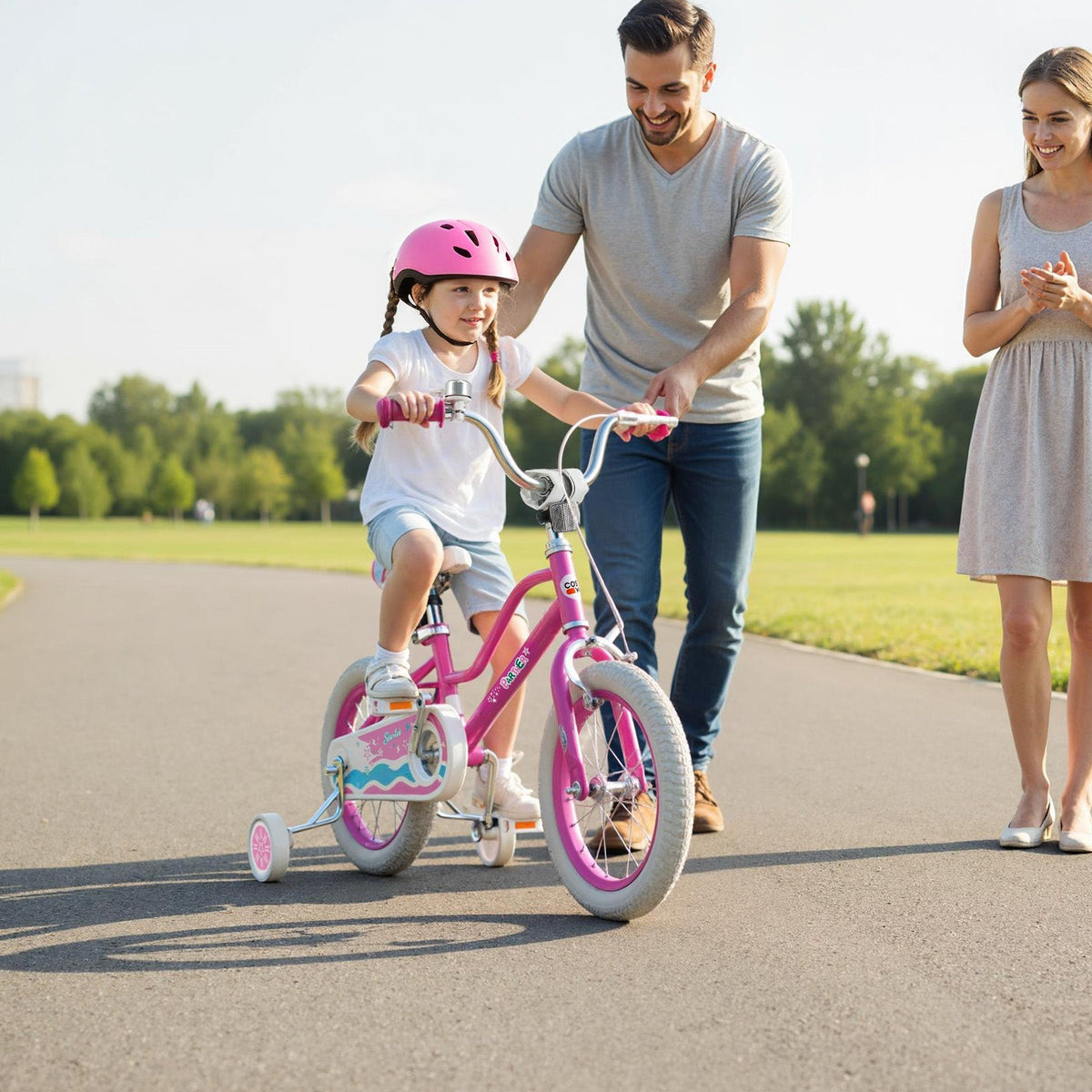 Pink kids bike with training wheels, 12-18 inch size, featuring a sturdy frame and colorful design, suitable for young children.