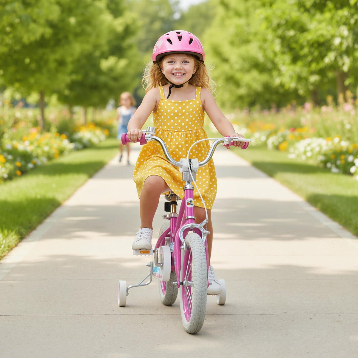 Pink kids bike with 12-18 inch wheels and training wheels, featuring a sturdy frame and colorful design for beginner riders.