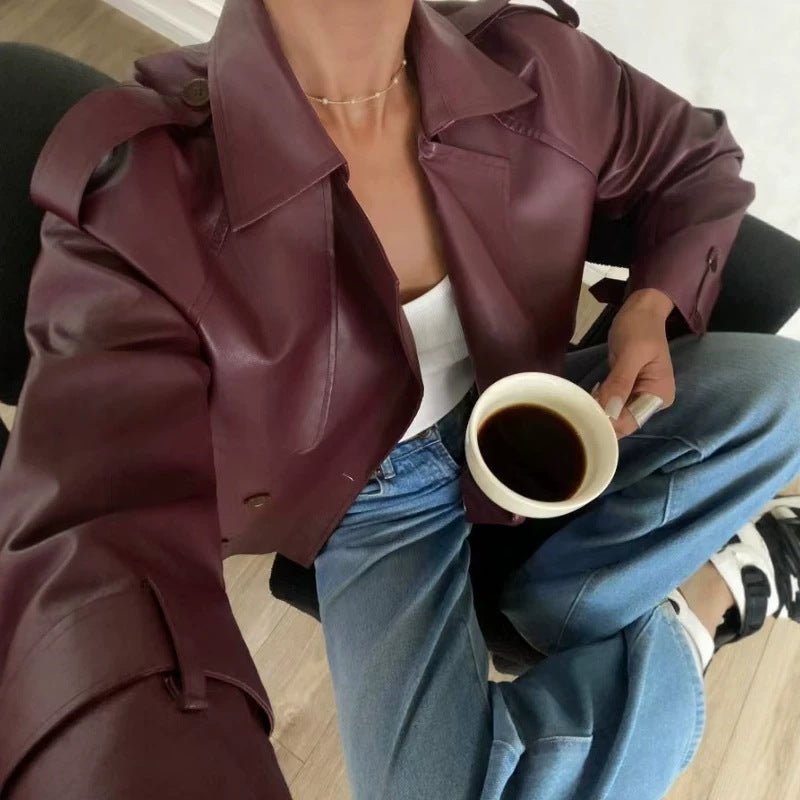 Adjustable-cuff vintage biker jacket in a classic leather style with zip closure and structured shoulders