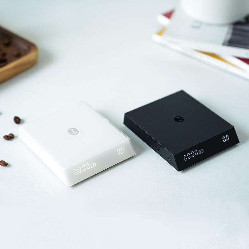 TIMEMORE Coffee Scale with Timer in Black Mirror Nano White, featuring digital display and sleek design for precise coffee brewing.
