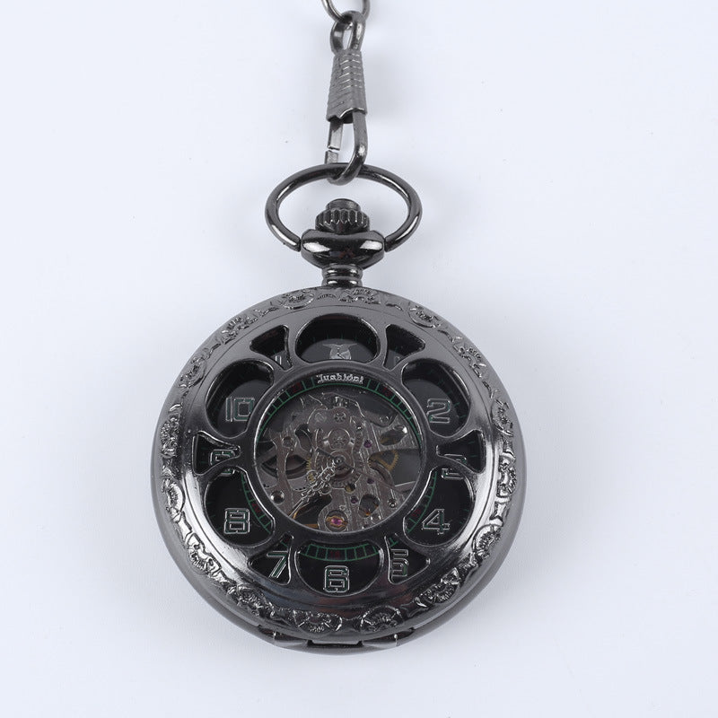 Vintage pocket watch with classic metal case and chain against a plain background