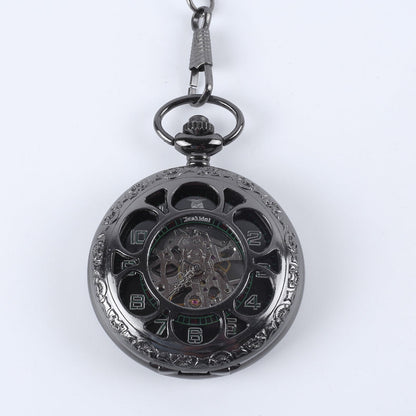 Vintage pocket watch with classic metal case and chain against a plain background