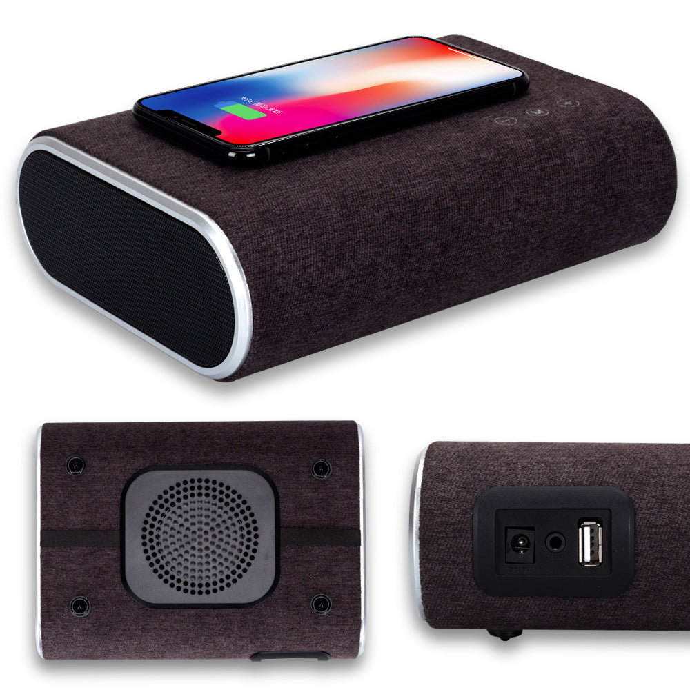 Wireless charger speaker with sleek design and built-in charging pad