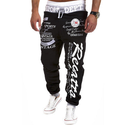 Loose drawstring track pants in a relaxed fit with elastic waistband and ankle cuffs