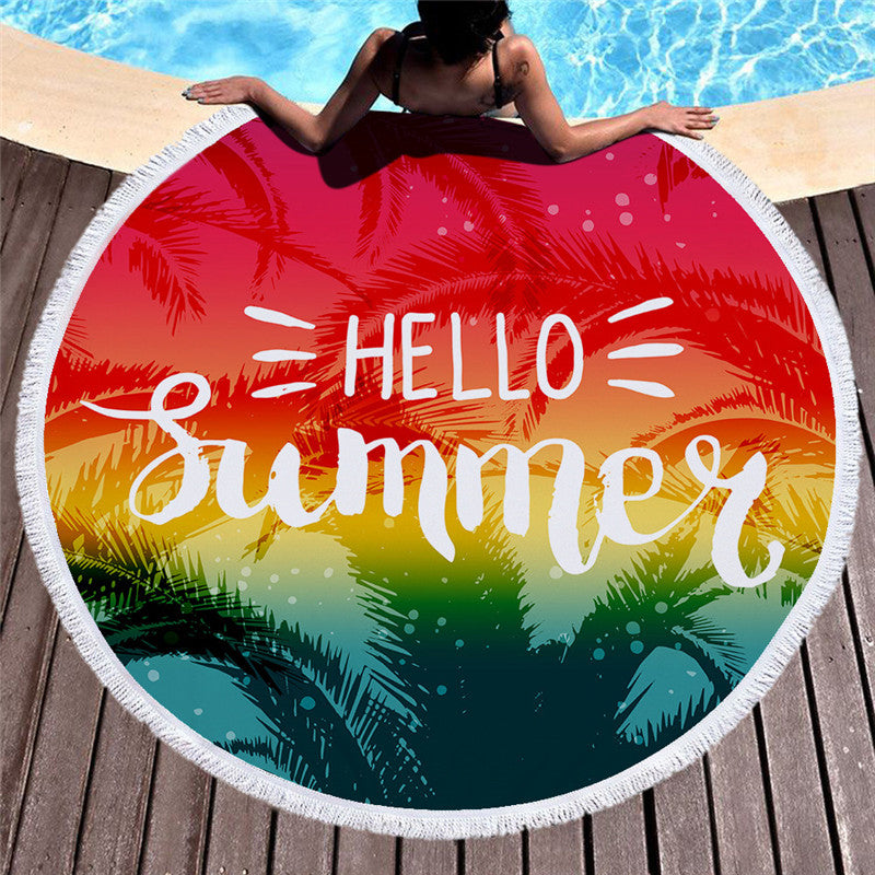 Printed microfiber beach towel with colorful design, shown flat for use as a bath towel or beach cushion