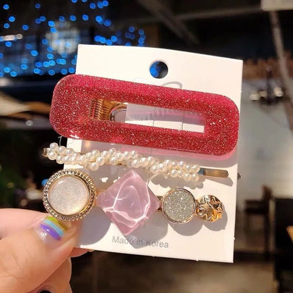 Pearl hair accessories displayed in a minimalist arrangement
