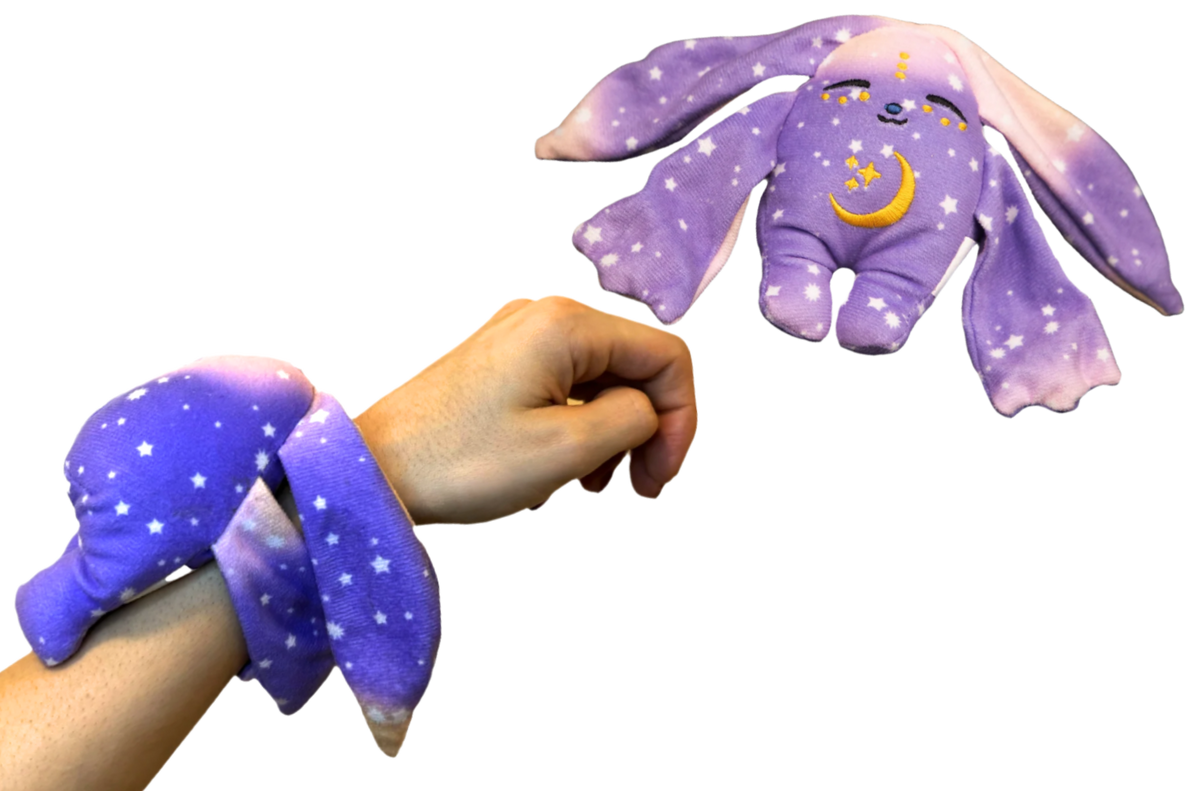 Moon Pals Polli Mini Wrist Hugger Plush, soft and colorful wrist accessory with cute plush design.