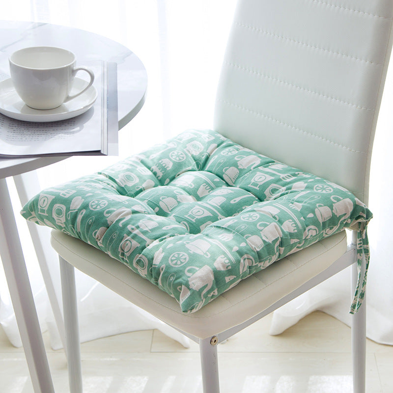 Summer chair cushion in a light, breathable fabric for outdoor seating
