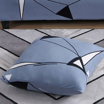 Printed sofa cushion cover in a colorful patterned design, shown on a sofa