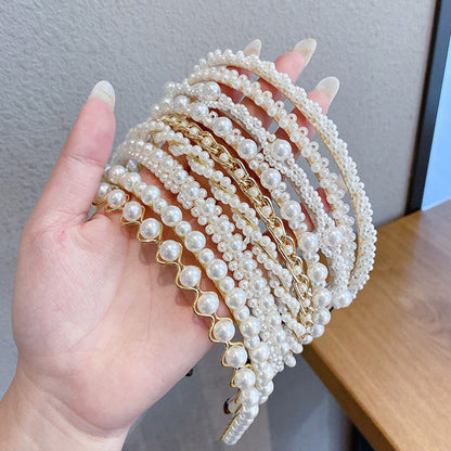 Thin pearl headband with delicate pearls on a slim band