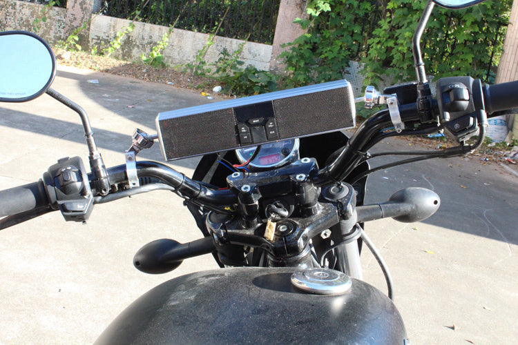 Waterproof motorcycle Bluetooth speakers by My Store mounted on a motorcycle handlebars