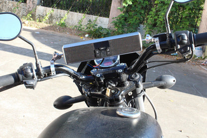 Waterproof motorcycle Bluetooth speakers by My Store mounted on a motorcycle handlebars