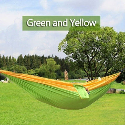 Portable nylon parachute double backpacking hammock suspended outdoors