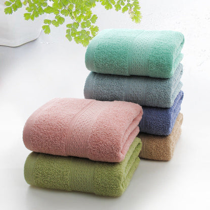 Thickened bath towel beach towel, soft textured fabric in a solid color fold-display image