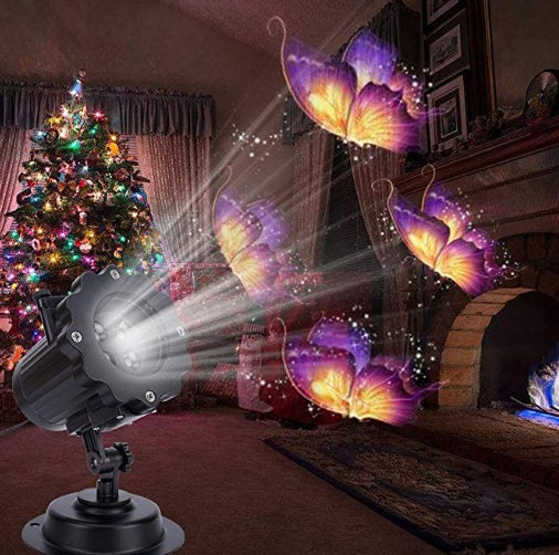 Christmas decoration outdoor LED laser projector light displaying festive patterns at night