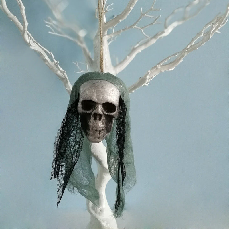 Halloween skull hanging decor suspended as a spooky seasonal decoration