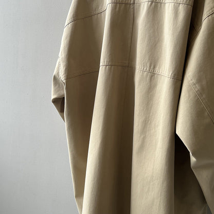 Japanese style women's workwear trench coat with stand collar and long silhouette