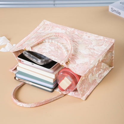 Relief-printed souvenir canvas gift bag with textured design and sturdy fabric handles