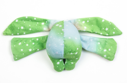 Moon Pals Clover Mini Wrist Hugger plush toy featuring soft, cuddly fabric and a cute clover design for gentle wrist comfort.