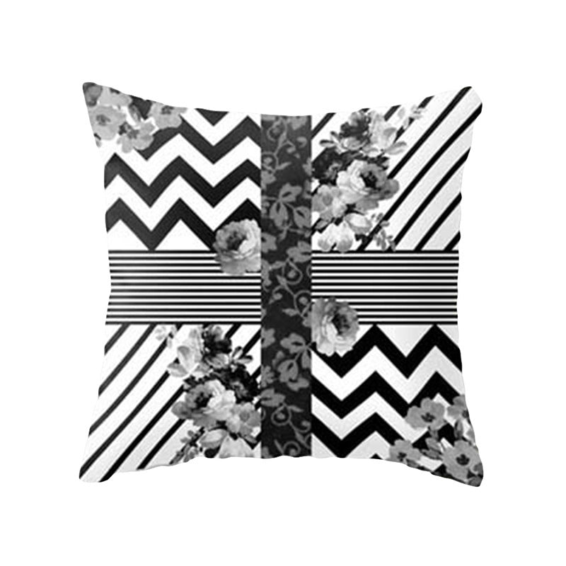 Pink geometric abstract decorative pillow case with modern patterned design, shown flat for home decor styling