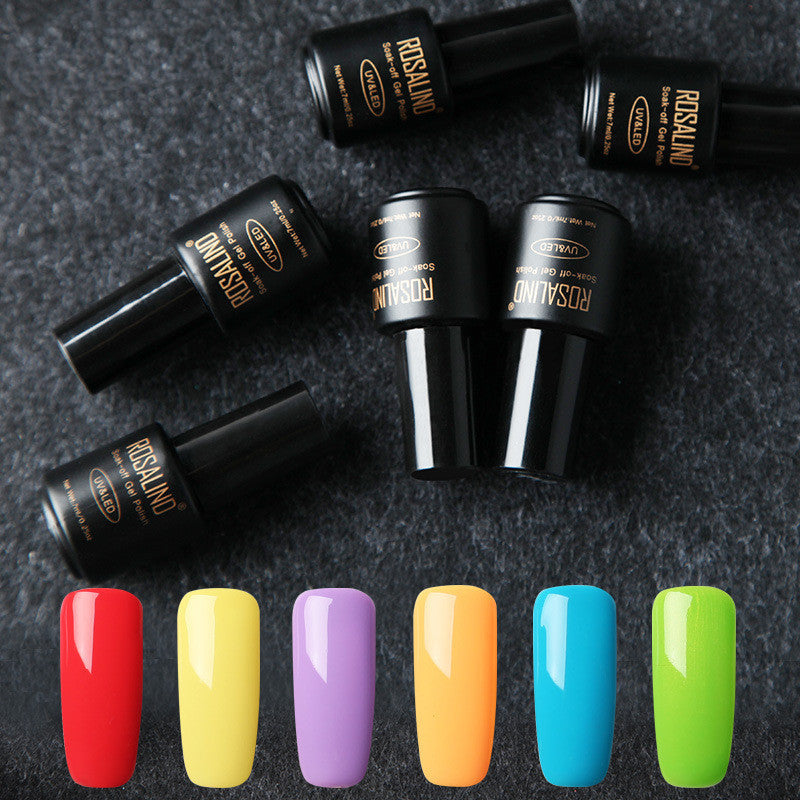Six bottles of Fine nail polish in assorted shades displayed together