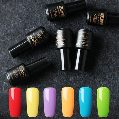 Six bottles of Fine nail polish in assorted shades displayed together