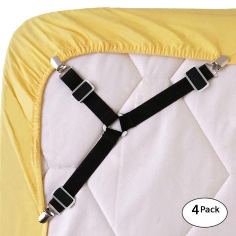 Bed clips sheet cover, white elastic straps securing fitted sheet to mattress