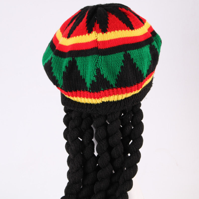 Braided straw hat and wig beret in natural woven texture, viewed from the front