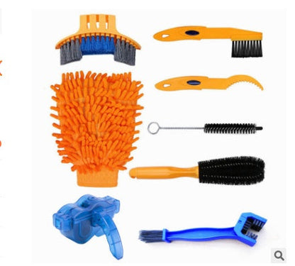 Bicycle maintenance chain cleaning tool in use, close-up view
