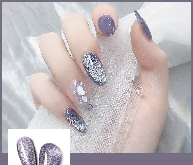 Milk tea crystal stone cat eye nail polish bottle in a soft neutral shade
